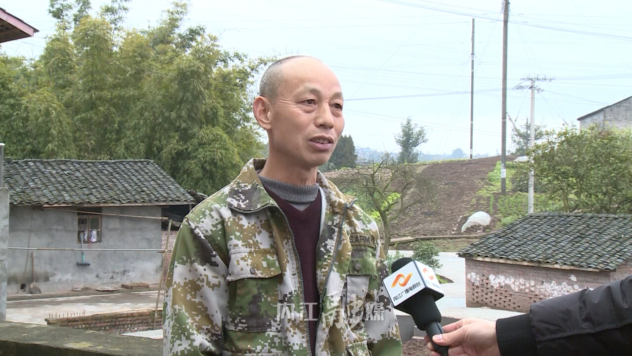 立春时节,走进隆昌市双凤镇唐家大院,蜿蜒的道路干净整洁,农家院落
